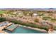A luxurious pool and golf course view, complemented by chaise lounges, lush greenery, and open space at 15 Rue Du Rivoli Pl, Henderson, NV 89011