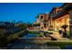 Enjoy this outdoor pool area with a spa, built-in grill, fireplace, and plenty of patio seating at 15 Rue Du Rivoli Pl, Henderson, NV 89011