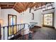Staircase with a decorative railing and stained glass window, showcasing elegant design and craftsmanship at 15 Rue Du Rivoli Pl, Henderson, NV 89011