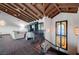 Staircase leading to a lounge area, showcasing built-in cabinets, stained glass, and comfortable seating at 15 Rue Du Rivoli Pl, Henderson, NV 89011