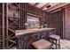 Luxurious wine cellar with custom racking, bar area, and temperature control at 15 Rue Du Rivoli Pl, Henderson, NV 89011
