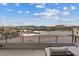 Balcony view overlooking the lake and surrounding cityscape on a sunny day at 16 Heron Harbour Dr, Henderson, NV 89011