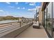 Scenic balcony with spiral staircase and views of the lake and mountains at 16 Heron Harbour Dr, Henderson, NV 89011