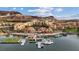 Picturesque community showcasing waterfront views, pedestrian access, and resort-style buildings at 16 Heron Harbour Dr, Henderson, NV 89011