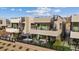 Exterior view of modern homes with multiple outdoor living areas and unique spiral staircases at 16 Heron Harbour Dr, Henderson, NV 89011