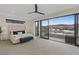 Spacious main bedroom with sliding glass doors that open to a beautiful water view at 16 Heron Harbour Dr, Henderson, NV 89011