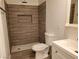 Modern bathroom featuring tile, a shower, and updated fixtures at 3168 S Eastern Ave # 45, Las Vegas, NV 89169