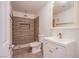 Stylish bathroom with tiled shower, modern sink, and vanity at 3168 S Eastern Ave # 45, Las Vegas, NV 89169