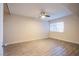 Cozy bedroom with a ceiling fan and bright window at 3168 S Eastern Ave # 45, Las Vegas, NV 89169