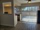 Bright dining area with modern floors and sliding glass doors leading to the patio at 3168 S Eastern Ave # 45, Las Vegas, NV 89169