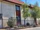 Well-manicured complex with wrought iron fencing, mature trees and plants at 3168 S Eastern Ave # 45, Las Vegas, NV 89169