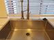 Close up of the kitchen sink featuring a modern faucet and stainless steel basin at 3168 S Eastern Ave # 45, Las Vegas, NV 89169