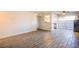 Spacious living room with tile flooring and sliding door leading to patio at 3168 S Eastern Ave # 45, Las Vegas, NV 89169