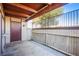 Enclosed patio area offering privacy and an outdoor space, complete with door access and overhead shade structure at 3168 S Eastern Ave # 45, Las Vegas, NV 89169