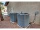 Exterior shot of two air conditioning units on the side of the home at 4156 Balmoral Castle Ct, Las Vegas, NV 89141
