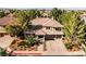 Beautiful single-Gathering home featuring a well-manicured front yard, covered entrance, and convenient two-car garage at 4156 Balmoral Castle Ct, Las Vegas, NV 89141