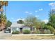 Inviting single-story house showcasing drought-tolerant landscaping, a covered carport, and a welcoming front entrance at 424 N 16Th St, Las Vegas, NV 89101
