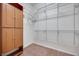 Spacious walk-in closet with shelving and storage solutions at 7908 Morning Gallop Ct, Las Vegas, NV 89131