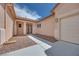 The home has a private entrance with double doors and mature landscaping at 7908 Morning Gallop Ct, Las Vegas, NV 89131