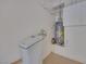 Garage utility area featuring a water softener and water heater at 7908 Morning Gallop Ct, Las Vegas, NV 89131