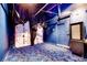 Home theater, under construction, features ambient lighting, decorative flooring, and space for immersive entertainment at 7908 Morning Gallop Ct, Las Vegas, NV 89131