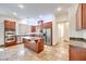 This kitchen has stainless steel appliances and a center island with granite countertops at 7908 Morning Gallop Ct, Las Vegas, NV 89131