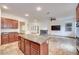 The kitchen has a center island, stainless steel appliances, and an open concept at 7908 Morning Gallop Ct, Las Vegas, NV 89131