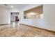 Living room showcasing open layout and travertine flooring at 7908 Morning Gallop Ct, Las Vegas, NV 89131