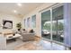 Comfortable sun room with outdoor access and scenic backyard view at 7908 Morning Gallop Ct, Las Vegas, NV 89131