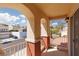 Balcony featuring colorful pillars and a view of the neighborhood street at 8516 Montago Valley Ave, Las Vegas, NV 89117