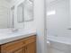 Bathroom featuring white cabinetry and a shower and tub combination at 8516 Montago Valley Ave, Las Vegas, NV 89117