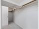 Walk-in closet with minimal shelving and carpeted floor at 8516 Montago Valley Ave, Las Vegas, NV 89117