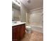 Bathroom featuring a tub and shower combo, and a single sink at 8920 Appellation Ave, Las Vegas, NV 89148