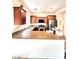 Well-equipped kitchen with granite countertops, stainless steel appliances, and wooden cabinets at 8920 Appellation Ave, Las Vegas, NV 89148