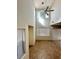 Bright living room with high ceilings, tile floors, and large windows, creating a comfortable space at 8920 Appellation Ave, Las Vegas, NV 89148