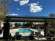 Community Pool with covered seating for residents to relax and enjoy the sun at 8920 Appellation Ave, Las Vegas, NV 89148