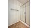 Bathroom shower with glass door and tile floors at 8920 Appellation Ave, Las Vegas, NV 89148