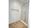 Clean shower with glass doors and tile flooring, providing a refreshing space at 8920 Appellation Ave, Las Vegas, NV 89148