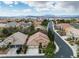 Aerial view of a residential neighborhood with well-maintained homes and landscaping at 1501 Via Salaria Ct, Henderson, NV 89052