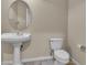Powder room featuring a sink and toilet at 1501 Via Salaria Ct, Henderson, NV 89052