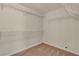 Walk-in closet with wire shelving and carpeted floor at 1501 Via Salaria Ct, Henderson, NV 89052