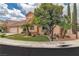 Corner lot home with well-maintained landscaping and a spacious driveway at 1501 Via Salaria Ct, Henderson, NV 89052