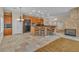 Kitchen showcasing stone accents, dark countertops and stainless appliances at 1501 Via Salaria Ct, Henderson, NV 89052