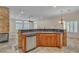 Kitchen island featuring a sink and a dishwasher at 1501 Via Salaria Ct, Henderson, NV 89052