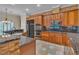 Updated kitchen featuring granite countertops and stainless-steel appliances at 1501 Via Salaria Ct, Henderson, NV 89052