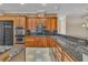 Kitchen with stainless steel appliances and granite countertops at 1501 Via Salaria Ct, Henderson, NV 89052