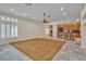 Open-concept living area with tile floors and bar seating near the kitchen at 1501 Via Salaria Ct, Henderson, NV 89052