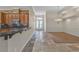 Inviting open-concept living area with tile flooring and a view of dining room and entrance at 1501 Via Salaria Ct, Henderson, NV 89052