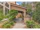 Outdoor living space with grill and mature landscaping at 1501 Via Salaria Ct, Henderson, NV 89052