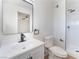 Bathroom featuring modern fixtures and hardware, including a black faucet and a glass-enclosed shower at 2878 El Cajon St, Las Vegas, NV 89169